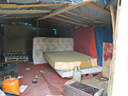 Intérieur d'une habitation après évacuation du camp.