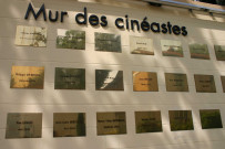 Institut Lumière, mur des Cinéastes, indications sur le premier film, charpente historique.